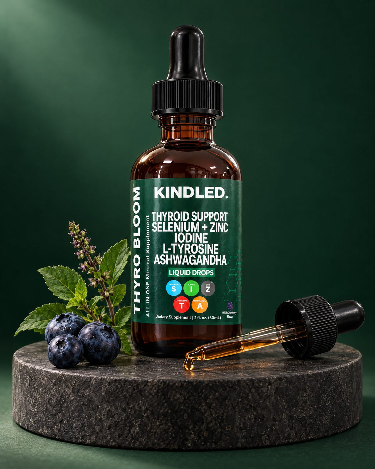 Kindled thyroid support drops on a dark stone pedestal